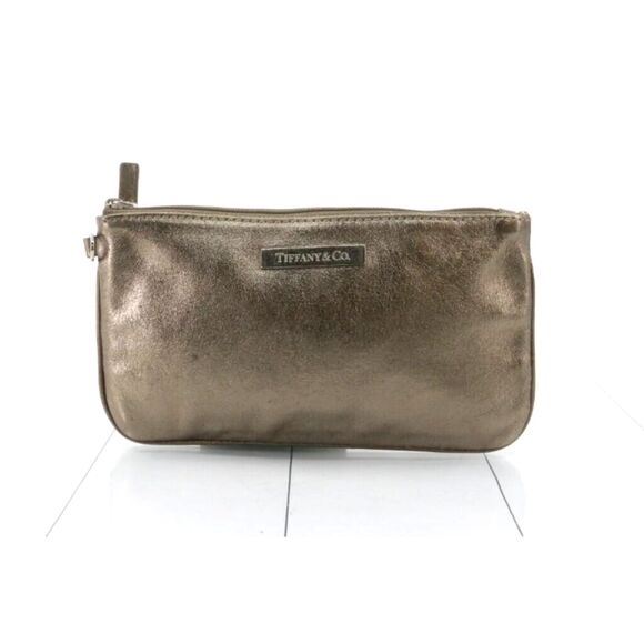 Tiffany & Co. Handbags - Tiffany & Co. Gold Pouch/Clutch with Iconic Tiffany Blue Interior